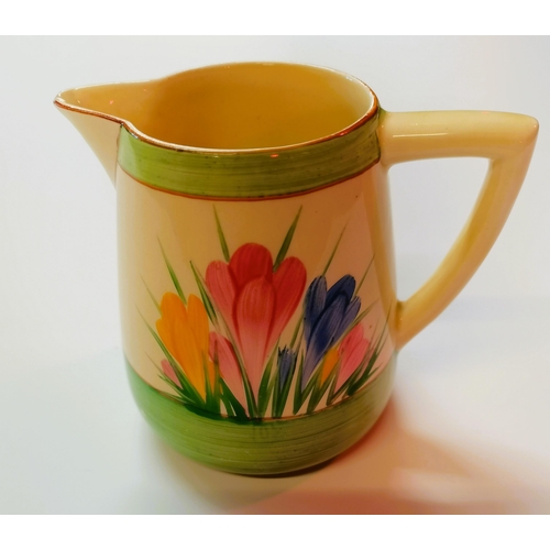 107 - Clarice Cliff (England) 'Crocus Pattern' milk jug H9.5cm - slight chip on edge