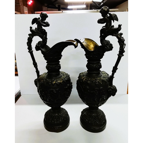 150 - A pair of Antique Bronze cherub urns H56cm - very good condition