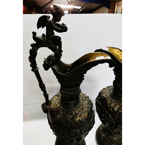 150 - A pair of Antique Bronze cherub urns H56cm - very good condition