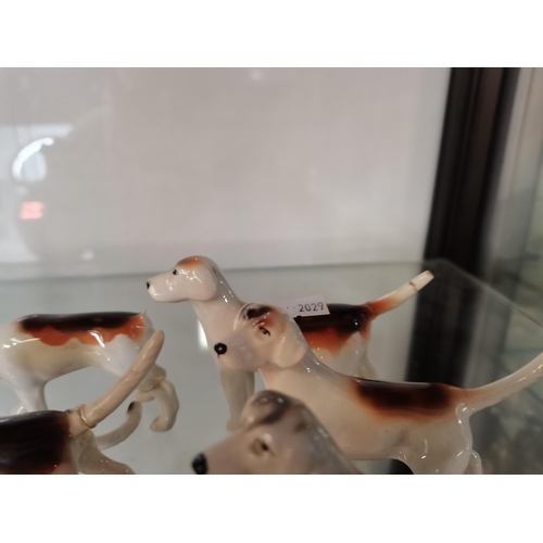 169 - X10 Beswick hunting hounds - A/F some damaged