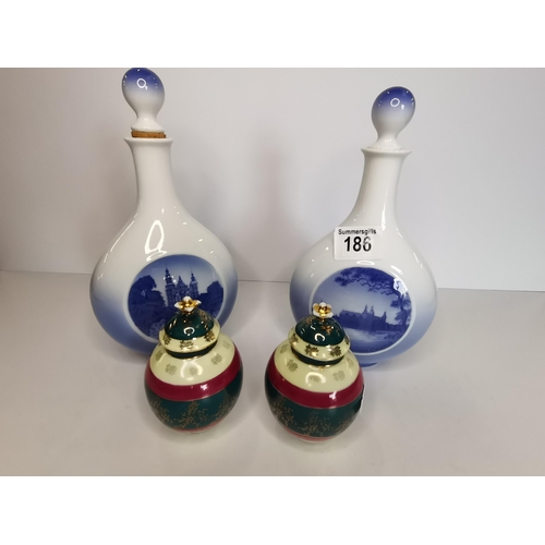 186 - Pair of Vienna Style lidded vases 11cm ht plus Two Royal Copenhagen Decanters Cherry Heering liqueur... 