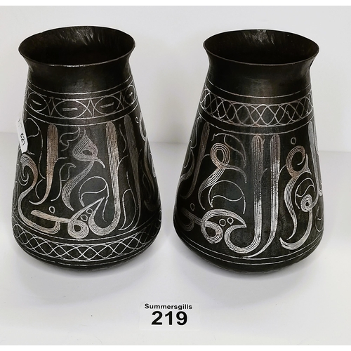 219 - Pair of Qajar silvered with inlaid decoraration vases 15cm ex condition