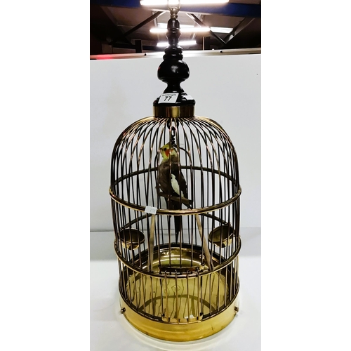 77 - Very decorative round brass bird cage circa 1920's with original brass feeders and under tray. plus ... 