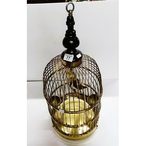 77 - Very decorative round brass bird cage circa 1920's with original brass feeders and under tray. plus ... 