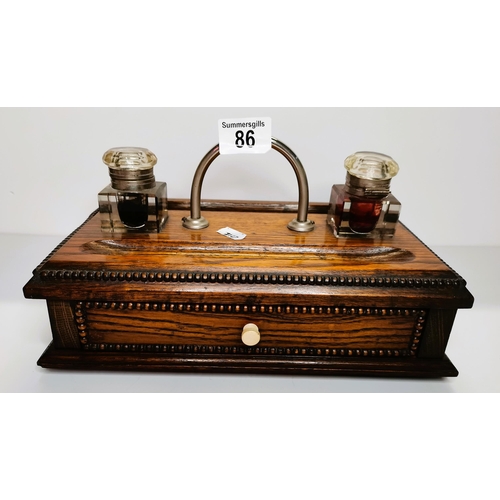 86 - Mahogany desk tidy with glass ink wells