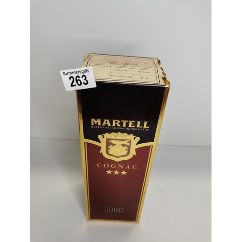 263 - A bottle of Duty Free export only Martell three star cognac brandy - unopened in original box