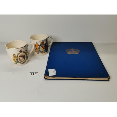 313 - 1950s Commemorative book on Queen Elizabeth II plus 2 x Coronation mugs