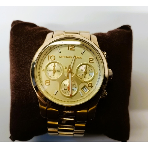 562 - Michael Kors ladies gold wrist watch