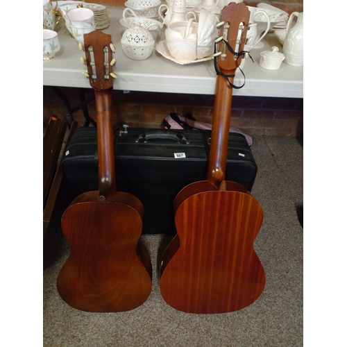 867 - 2 acoustic guitars and suitcase