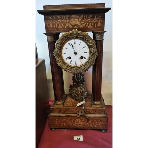 22 - French inlaid Portio Mantle Clock - Damage to face and rear foot. Hand missing. With Key