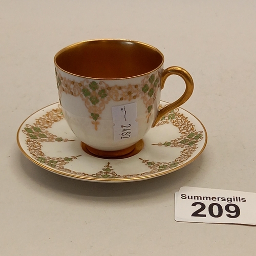 209 - Royal Worcester cup and saucer