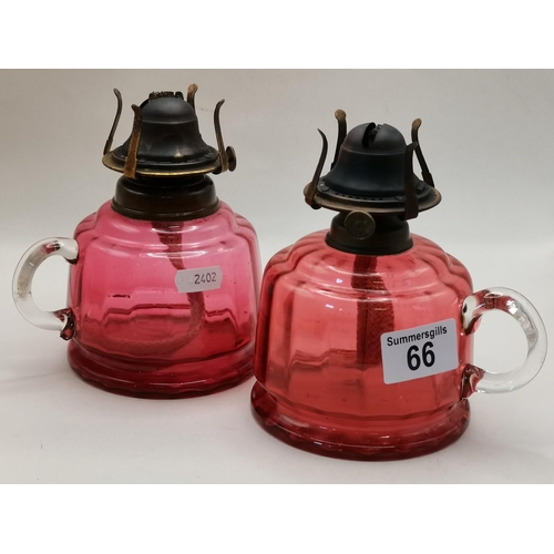 66 - x2 Antique Atlas - Victorian ruby glass finger oil lamps (missing glass shades)