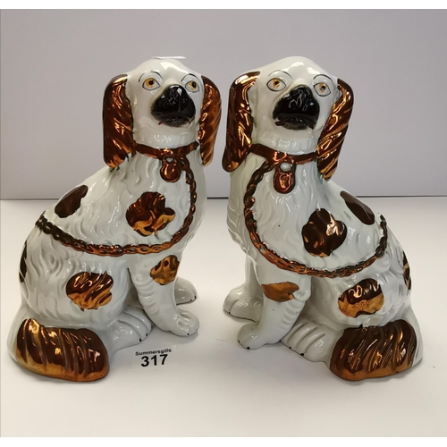 317 - A Pair of Staffordshire dogs