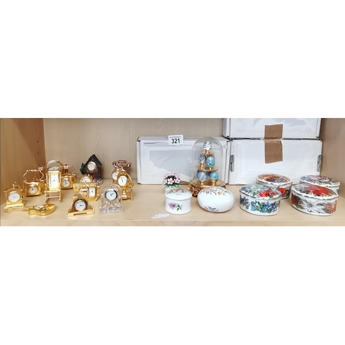 321 - A collection of miniature clocks and Ardleigh Elliott trinket dishes