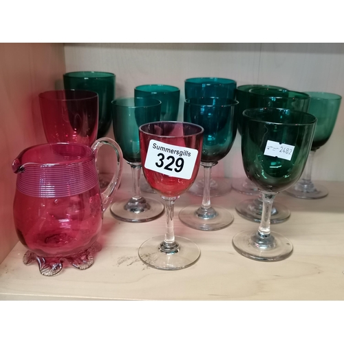 329 - x9 Victorian Bristol green wine glasses plus x2 Cranbury wine glasses and a jug