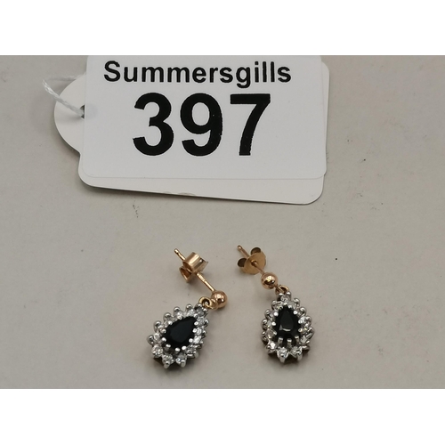 397 - A pair of teardrop Sapphire and Diamond earrings