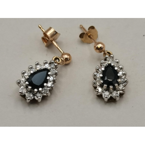 397 - A pair of teardrop Sapphire and Diamond earrings