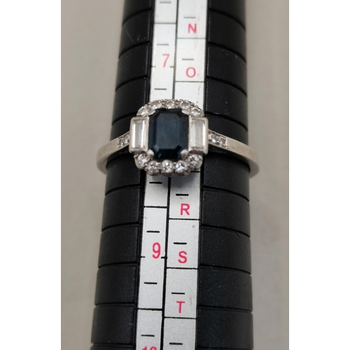 408 - A Beautiful Platinum ring with Sapphire and Diamonds size Q