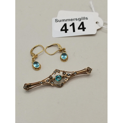 414 - 9ct Gold brooch and earrings with aquamarine stones - 4 grams