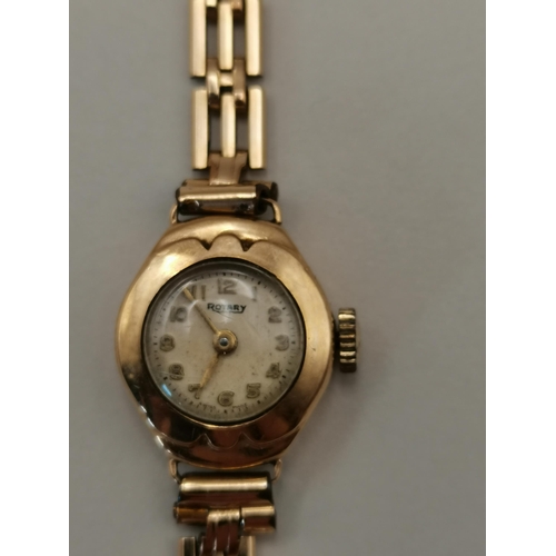 426 - 9ct gold ladies wrist watch with rolled gold strap working