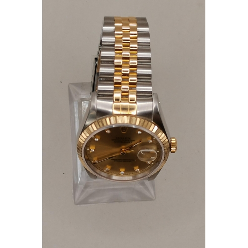 477 - Rolex Oyster Perpetual Datejust 36mm in Oystersteel and yellow gold features a diamond-set dial and ... 