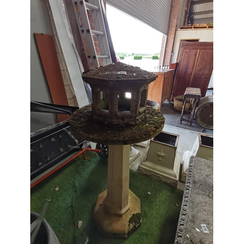 977 - Stone bird house on plinth 130cm Ht