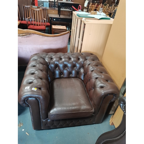 989 - Brown leather Chesterfield Armchair