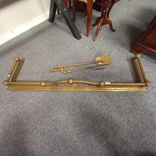 1152 - Brass fire curb and utensils W132cm