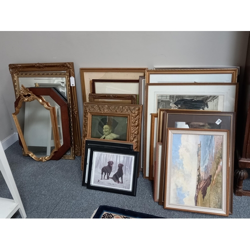 1165 - A large collection of framed pictures and mirrors