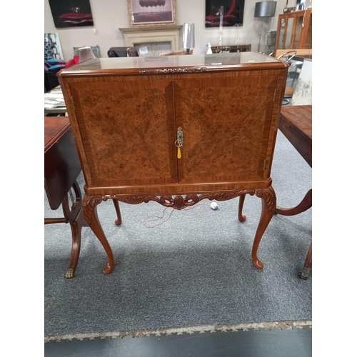 1240 - Mid 20th Century burr walnut cocktail cabinet with key and accessories inside