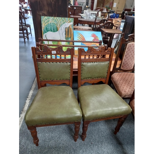 1251 - 2 x oak leather seated dining chairs and towel rail