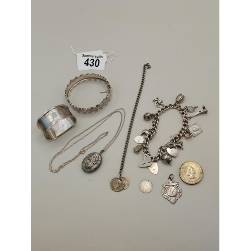 430 - A collection of Silver and continental Silver items including bracelets, Locket etc 80 grams