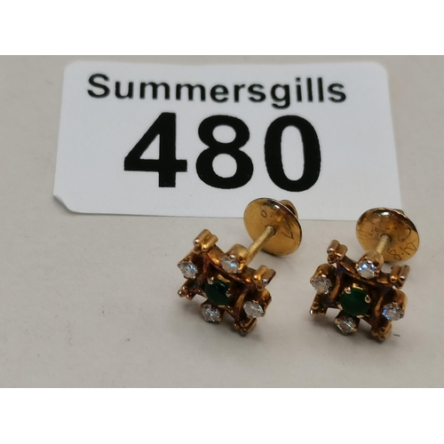 480 - A pair of diamond and emerald earrings plus several others