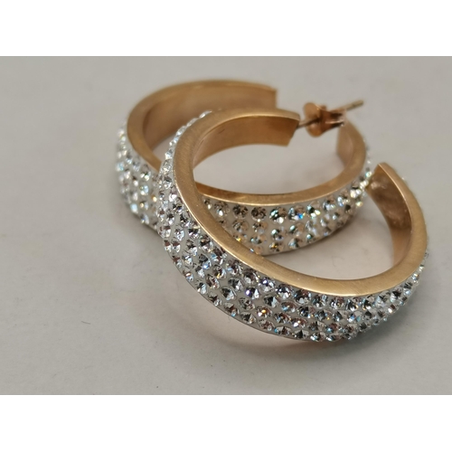 488 - A Pair of Diamond hoop earrings set in 9ct Gold (1 D/D)