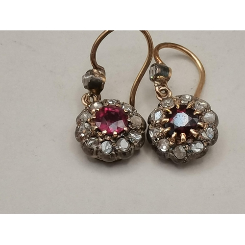 400b - Diamond and ruby earrings. Gross weight 2 grams