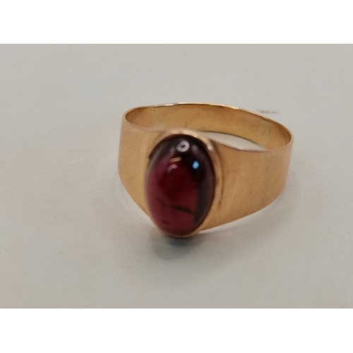 410 - Yellow Metal ring and red centre stone size P (no hallmarks)