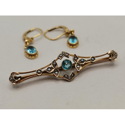 414 - 9ct Gold brooch and earrings with aquamarine stones - 4 grams