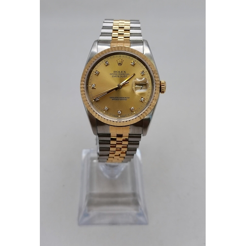 477 - Rolex Oyster Perpetual Datejust 36mm in Oystersteel and yellow gold features a diamond-set dial and ... 