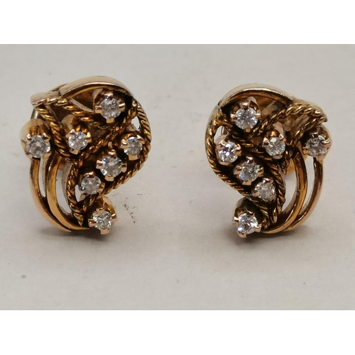 493a - Diamond and gold earrings in a floral style decoration