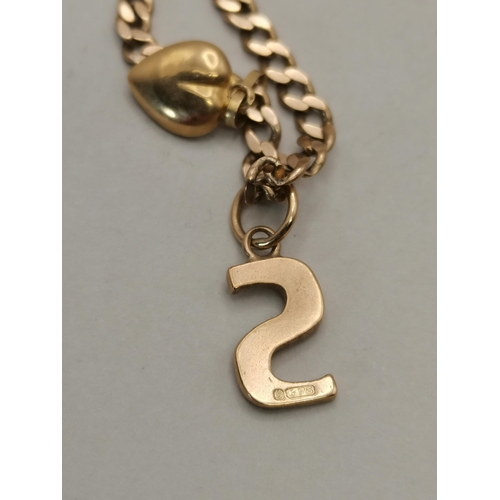 516 - 18ct gold necklace with 'S' pendant 4grams plus 9ct gold bracelet with 'S' charm on it 3grams