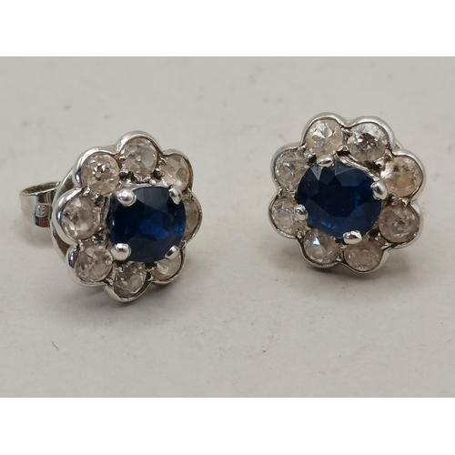 519 - A Pair of Diamond and sapphire Earrings set in 18ct white gold