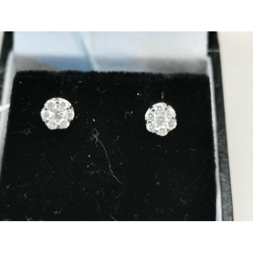 524 - 18ct all white gold Brilliant Cut diamond set cluster earrings, each earring consists of one central... 