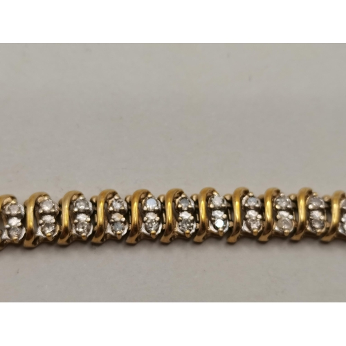 537 - Diamond and gold set bracelet 18cm long 10g