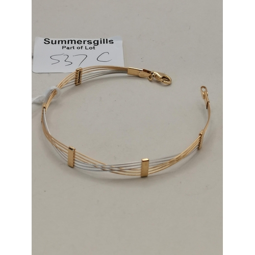 537c - A 14k gold bracelet 5g in two tone gold