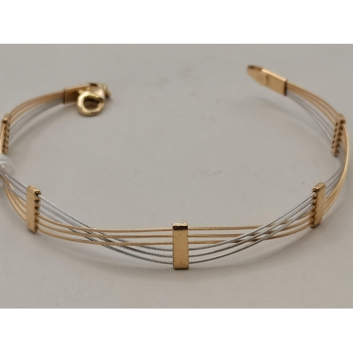 537c - A 14k gold bracelet 5g in two tone gold