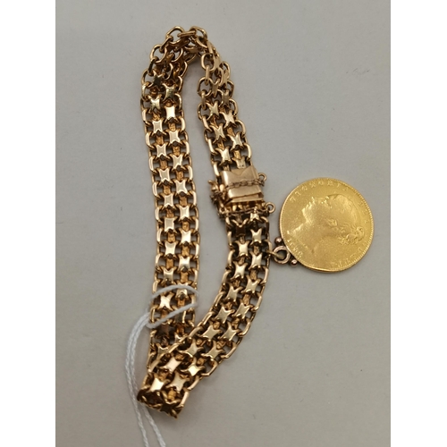 537d - A 14k gold bracelet with 1842 gold sovereign 1842 attached 32g total