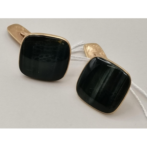 537i - A pair of tiger eye style cufflinks in 9ct gold total 12g