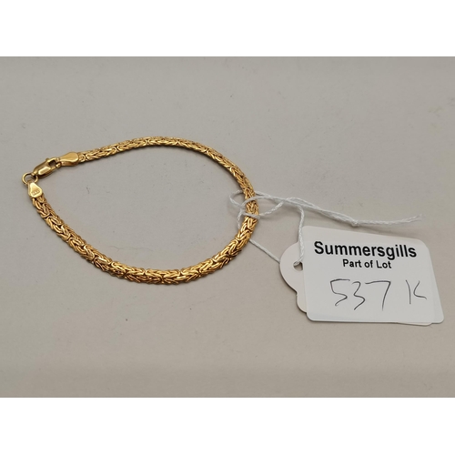 537k - A 14k gold bracelet 4g