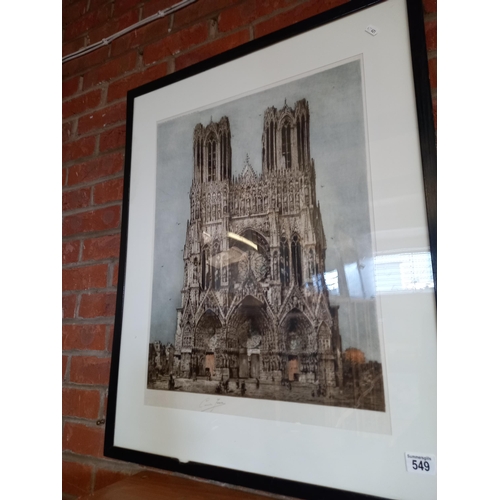 549 - A framed signed coloured engraving of Cathedral Note Dame de Reims France 85cm x 65cm