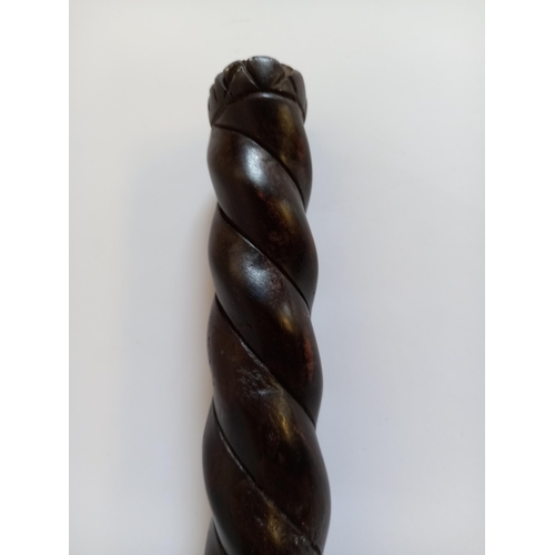 580 - An African style stick with carved and twisted decoration